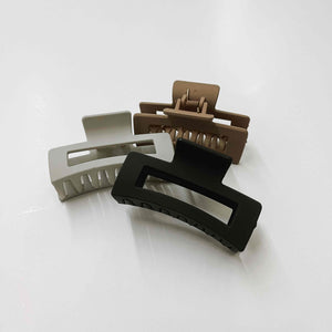Rectangle shape hair claw clip. Scarlett Square Claw Clip in gray, brown, and black. Matte claw clip